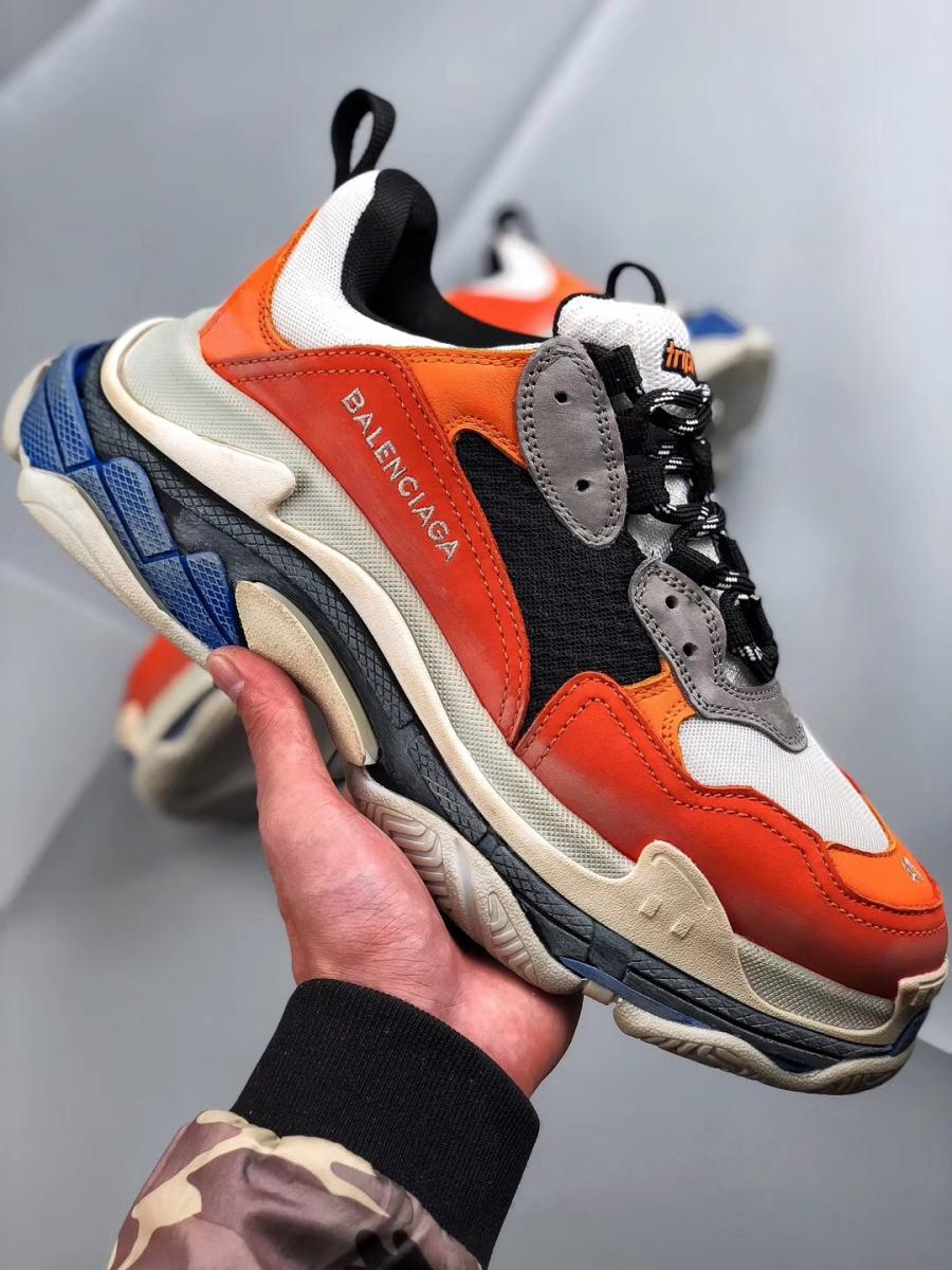 white and orange balenciagas